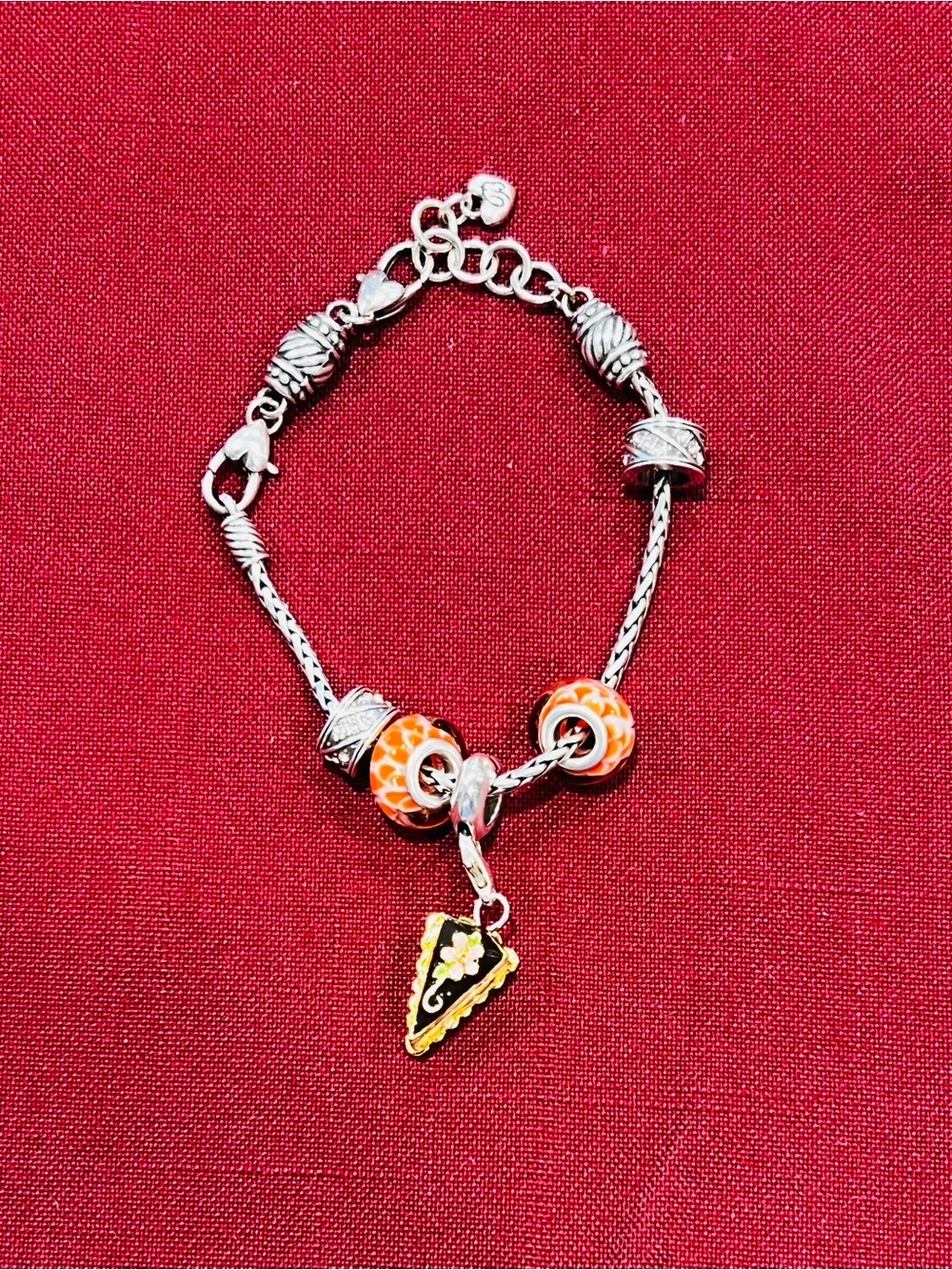 Brighton - Silver Charm Bracelet with Orange Beads and Slice Pendant